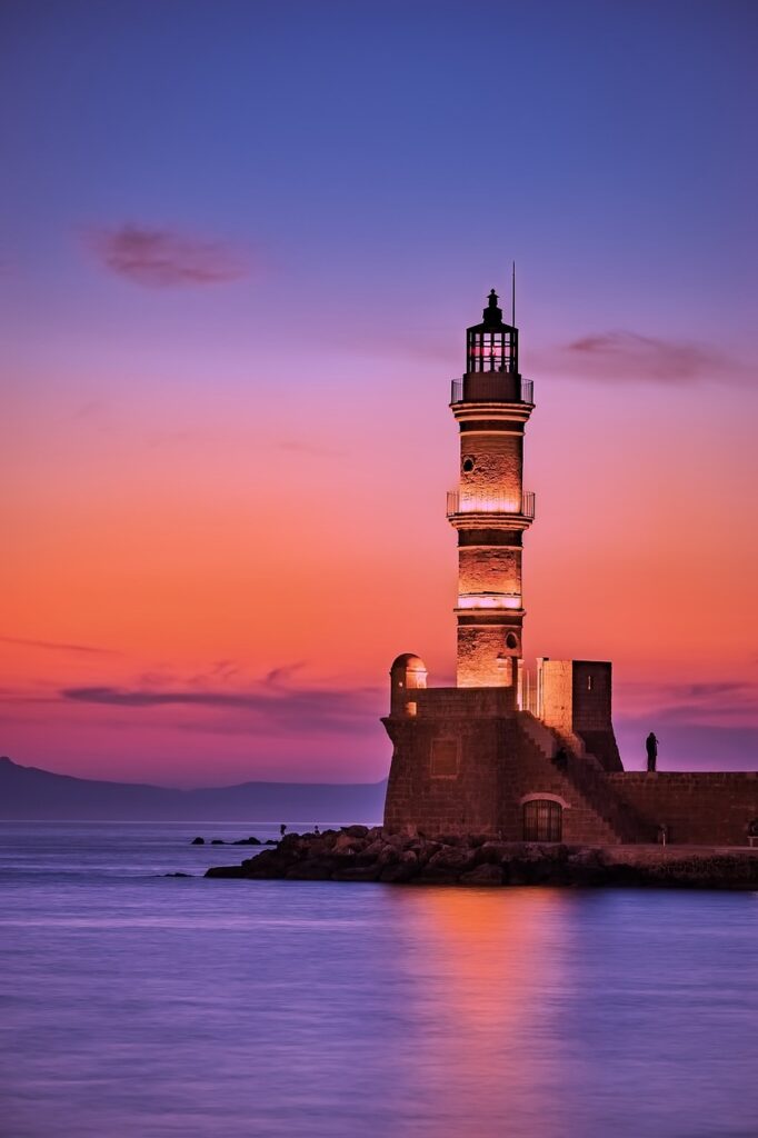lighthouse, sunset, coast, tower, watchtower, navigation, beacon, illuminated, dusk, twilight, greece, sea, ocean, sunrise, nature, landmark, historic, sky, mediterranean, iphone wallpaper, phone wallpaper